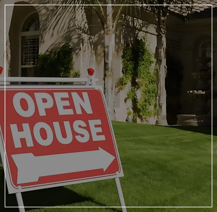 A red and white sign that says open house